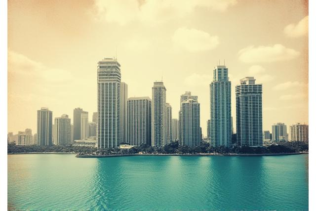 Historic photograph of Miami city skyline with subtle modern overlay, symbolizing legacy and evolution of BCA Financial Services.