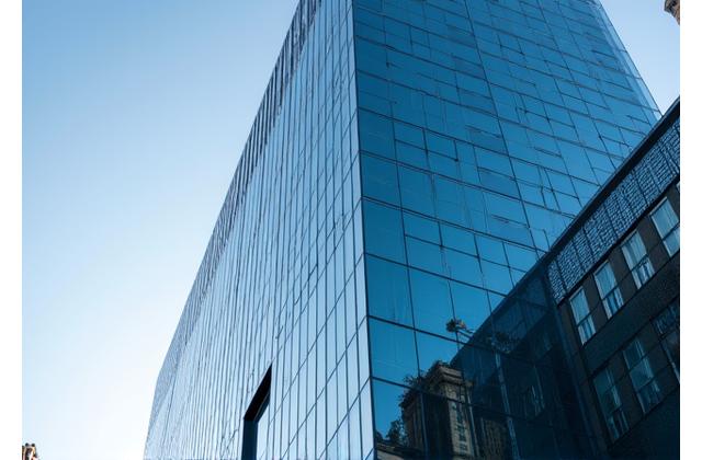 Modern office building facade representing commercial business collections